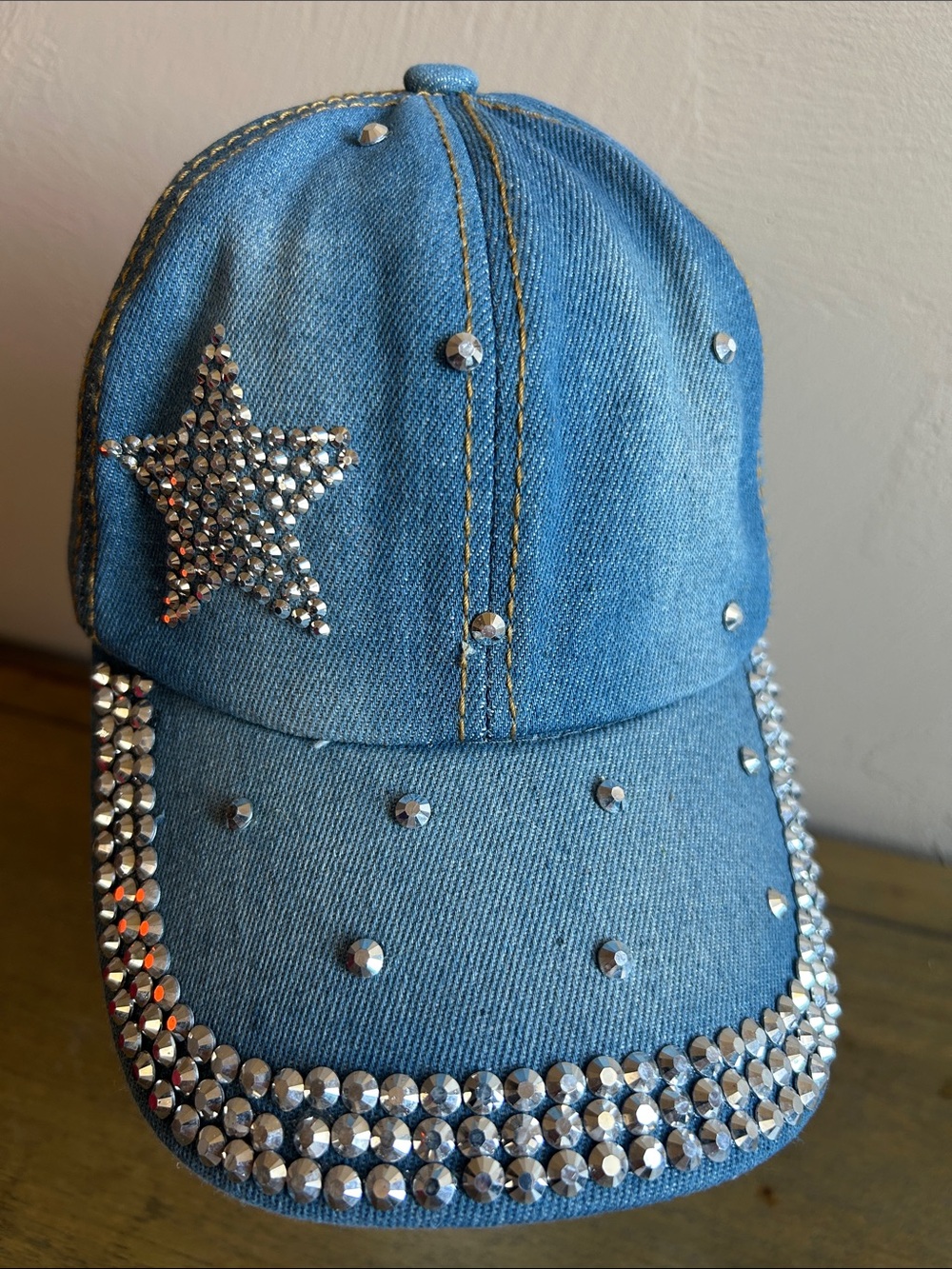 Olivia & Kate New York Blue Denim Cap With Studded Star And Brim Accents.